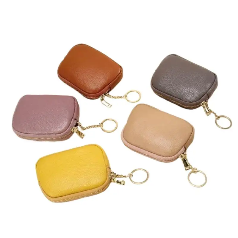 Braune Geldbörse aus PU-Leder mit Litschi-Struktur, robustem Reißverschluss und Schlüsselring für den täglichen Gebrauch zum Tragen von Bargeld, Karten, Lippenstift und kleinen Utensilien. – Detail 11