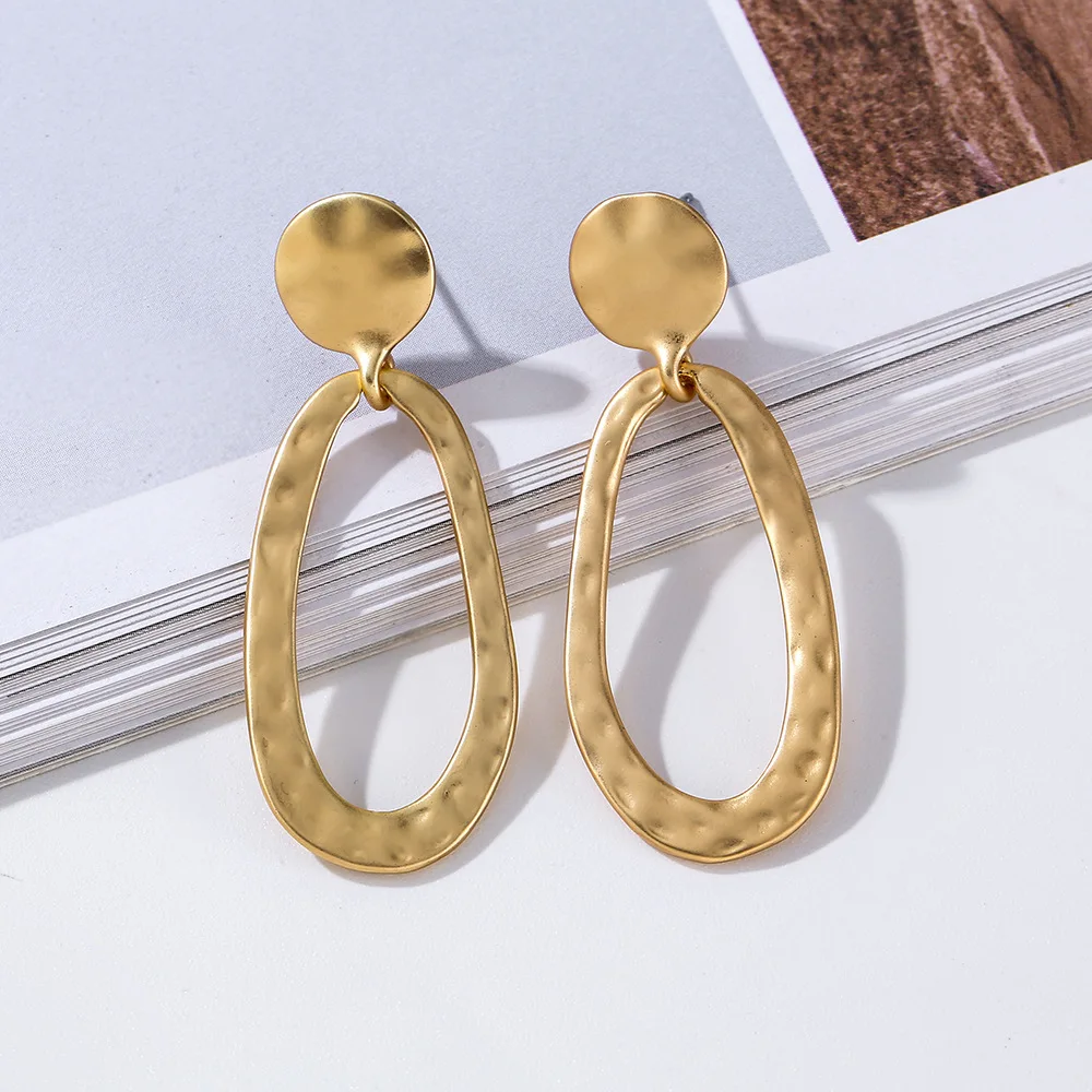 Retro bohemian style women's versatile earrings geometric Hong Kong style mid-length percussion earrings