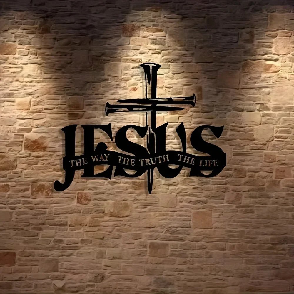 An Elegant Black Metal Cross Wall Art Piece with the Words 