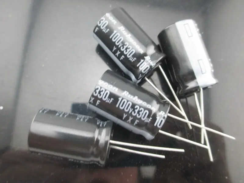 

4pcs RUBYCON YXF 330uf 100v 330mfd Capacitor high frequency 105℃ 16*25mm