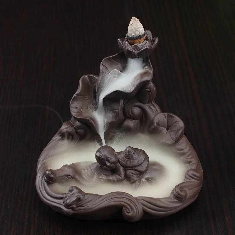 

Hot Sale Creative Cowboy Lotus Pond Smoke Back Censer Cone Incense Burner Incense Stick Holder