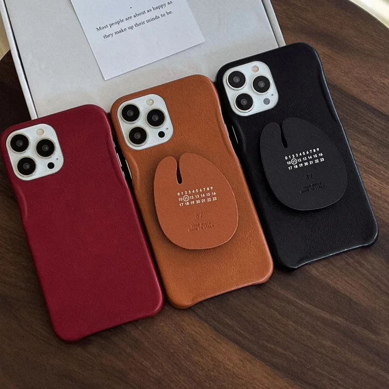 

Suitable for Apple17/15/14/13PROSolid Color Leather Phone CaseiPhone15p/16Digital Bracket Soft