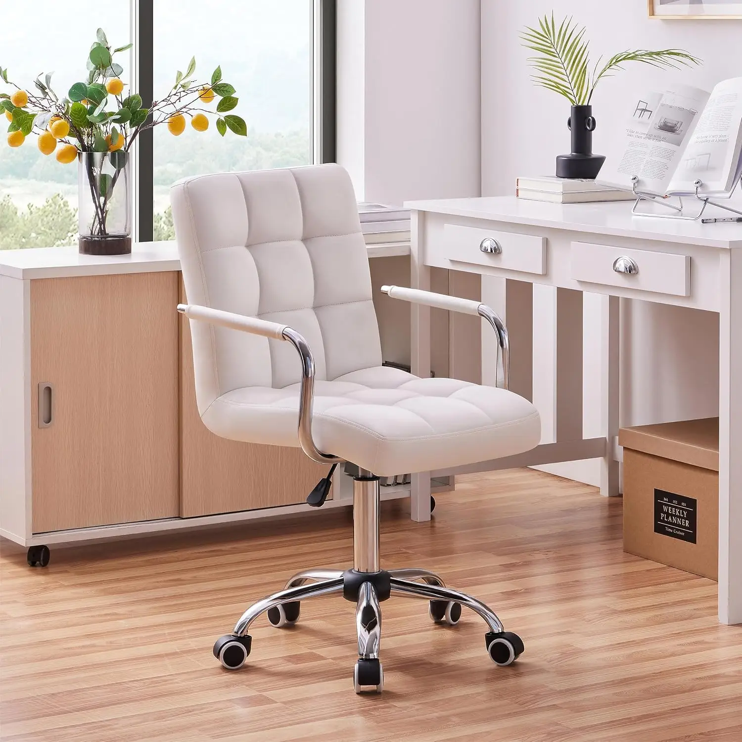 White Vanity Desk Chair with Wheels, Tufted PU Leather Armchair | Padded foam seat on a sturdy chrome metal base swivels, rolls smoothly, adjusts 19-25 in, wipes clean, and sets up easily.