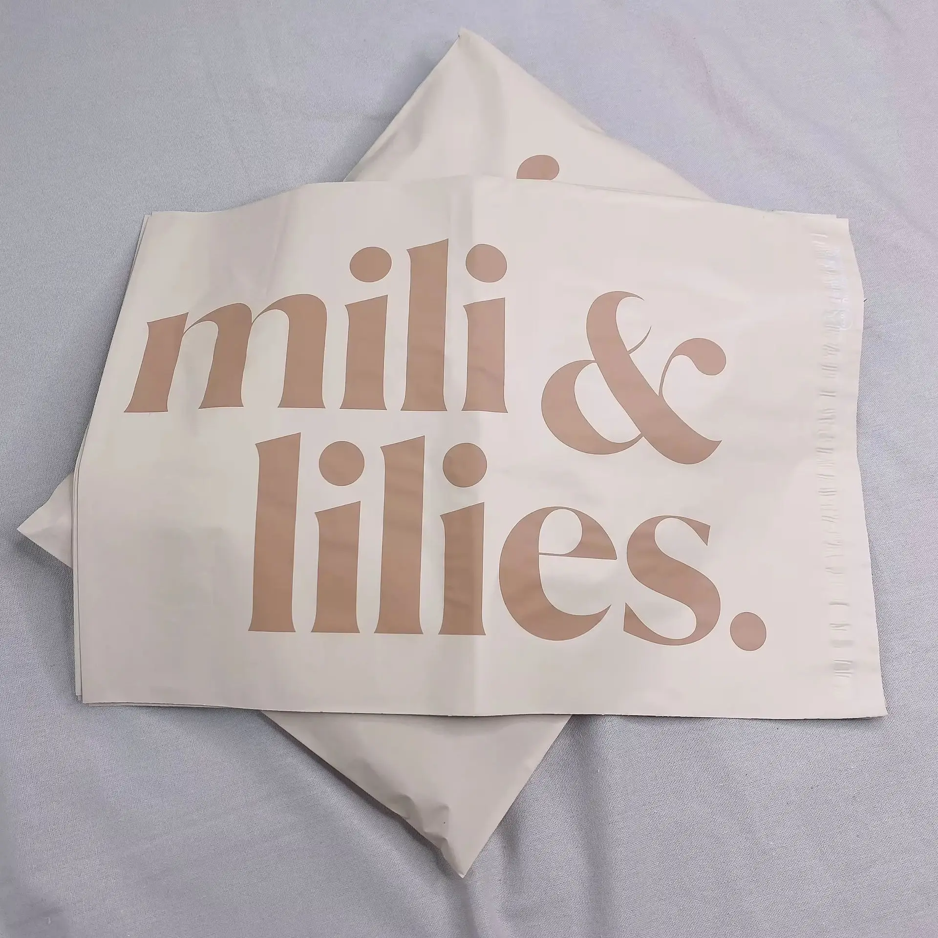 Apricot matte mail bag brand new material plastic plastic gift bag thick bag envelope express bag printing company logo slogan