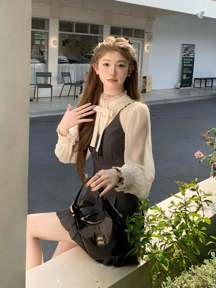 Korean Three Piece Set Bow Lantern Sleeve Shirt+Solid Color Suspender Vest+High Waist Slimming A-Line Pleated Skirt Set Of Three