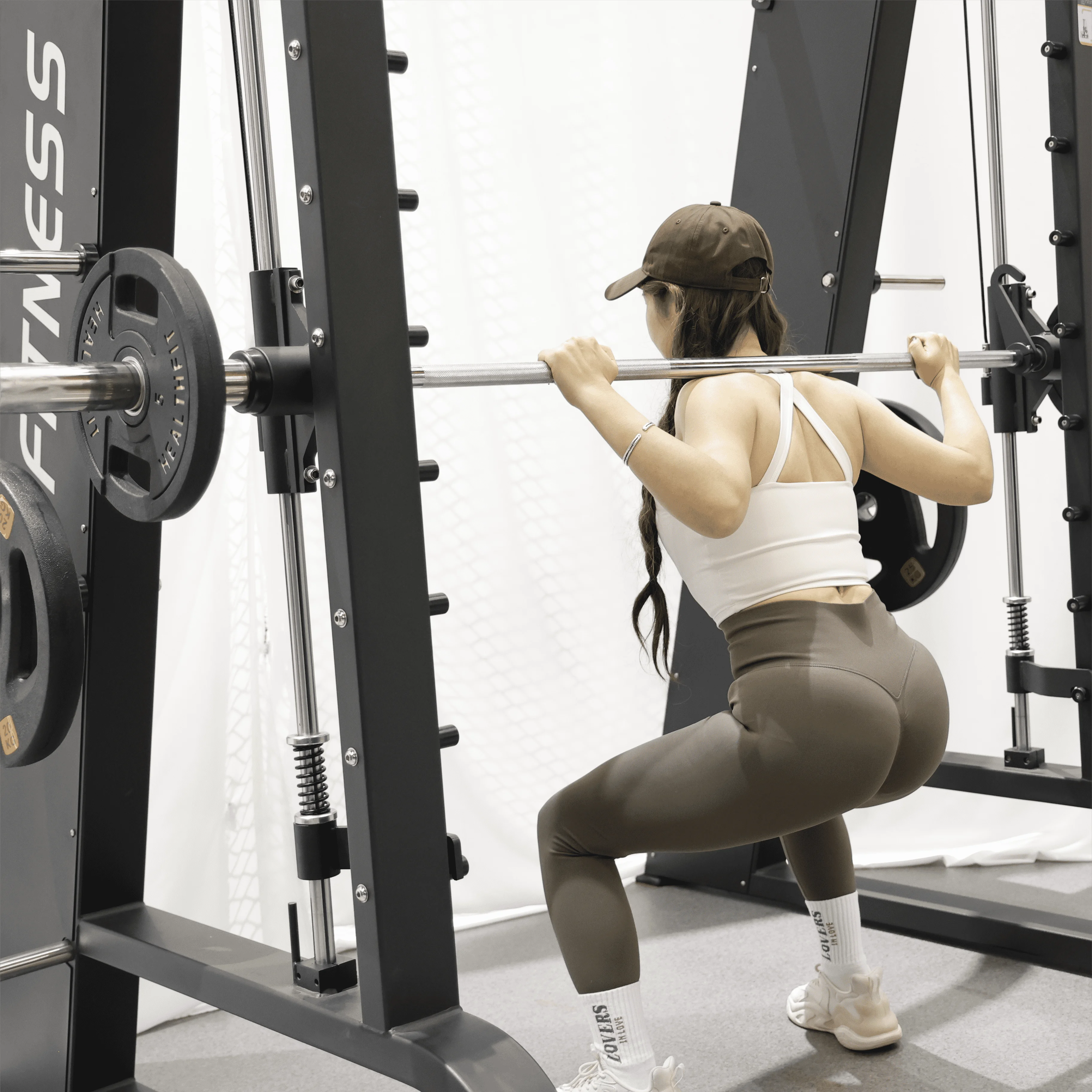 Machine professionnelle de Squat de Machine multi Smith de support de puissance en acier avec la plaque chargée pour l'entraînement musculaire