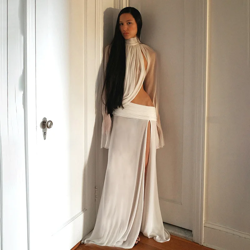 

Женский комплект: прозрачный топ с высоким воротом и юбка макси с разрезом, рукава-колокол, сексуальный образ из двух предметов