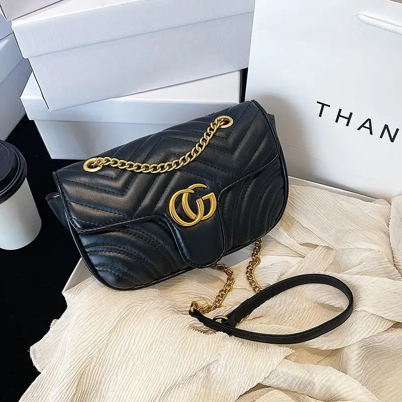 حقيبة كتف احترافية أنيقة للنساء أثناء السفر مع مادة من جلد الغزال ومقصورات متعددة وسطح ناعم ومريح