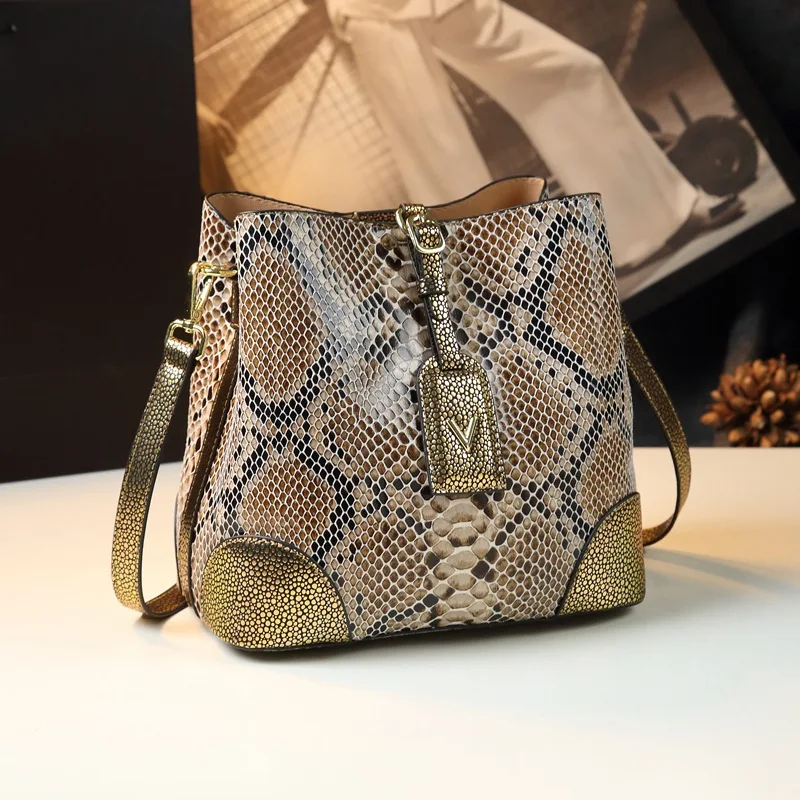 High-end snake-pattern bucket bag women, new summer model, light luxury niche design, patchwork handbag, shoulder bag,