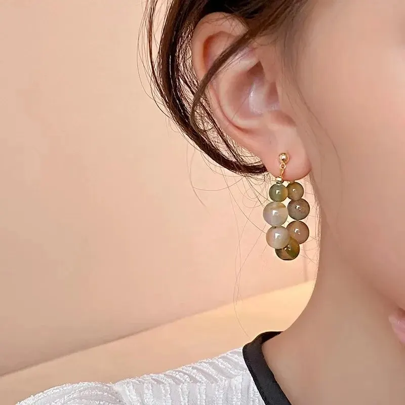 Boucles d'oreilles perlées colorées pour femmes avec fouet de conception de niche, boucles d'oreilles de tempérament haut de gamme, boucles d'oreilles de style ethnique