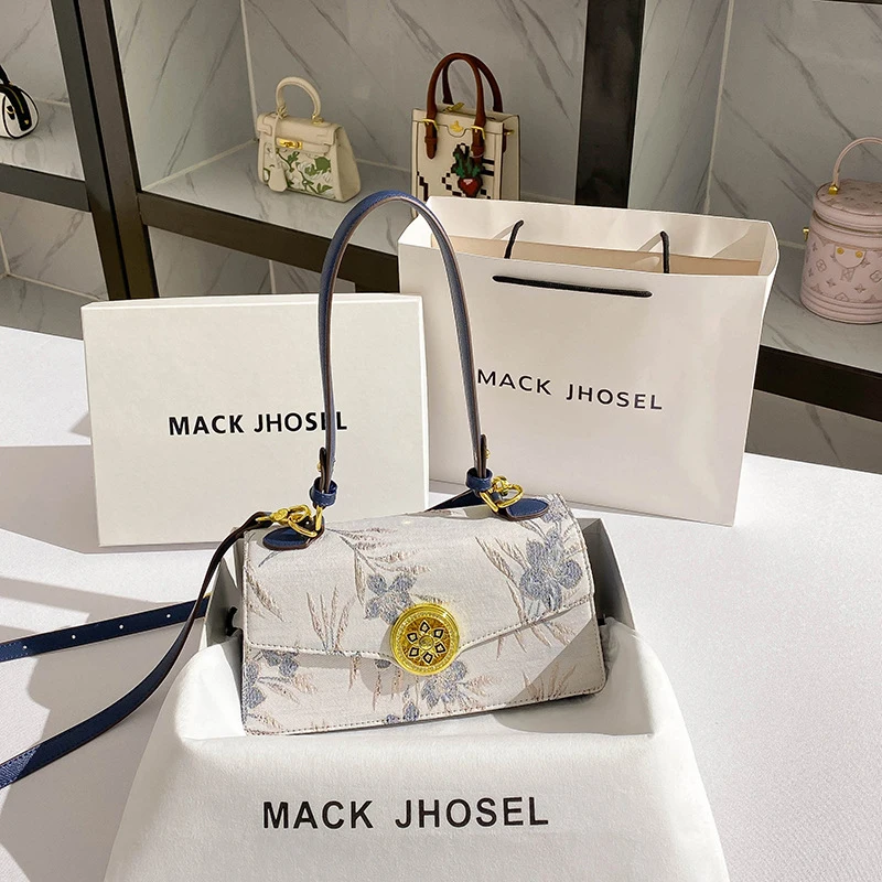 

Элитная нишевая сумка-багет с вышивкой, легкая роскошная сумка для повседневного использования, сумка через плечо.