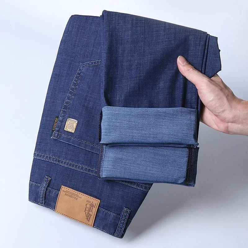 Celana Jeans Pria Musim Semi dan Gugur, Model Lurus, Longgar, Kasual, Stretch, Bahan Sutra Es Musim Panas, Merk Trendi, Celana Panjang, Jeans Pria yang Dicuci