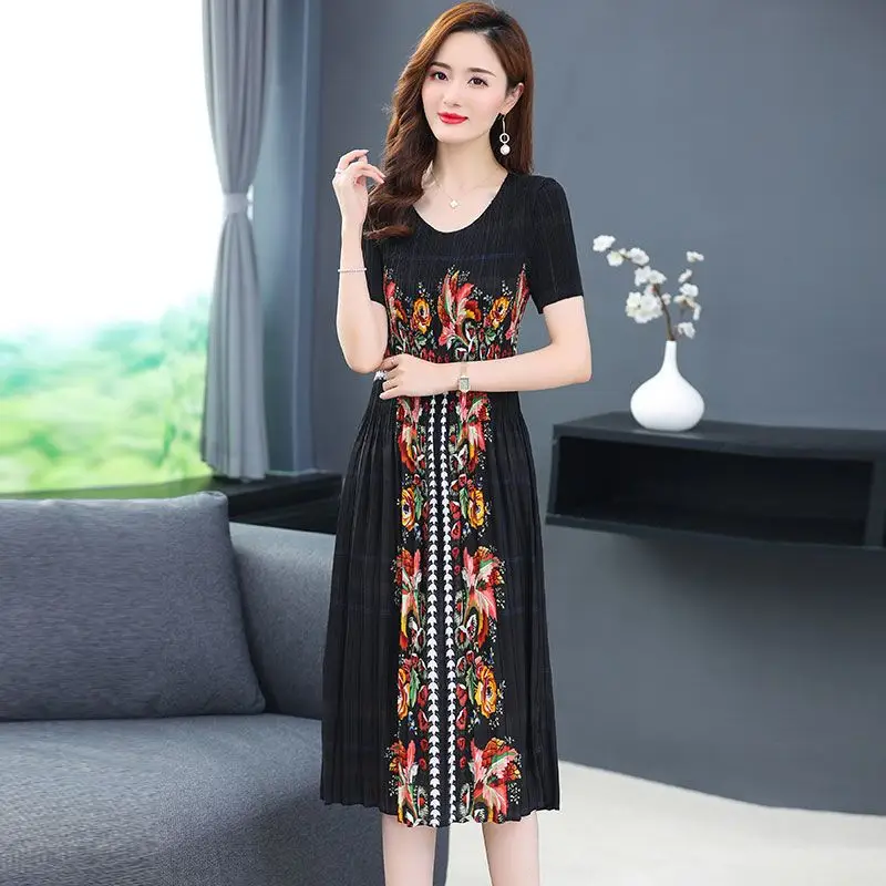 

High end slim pleated dress female 2023 summer new imperial sister style o neck thin short sleeve printed magic dress women