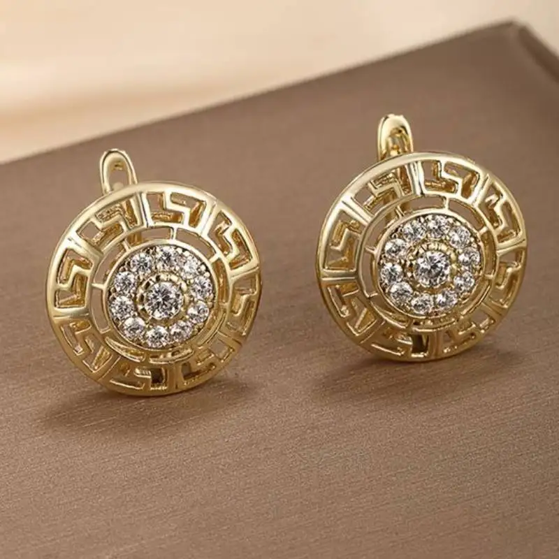 Huitan Goldfarbene runde Creolen für Damen, hohles Design, modisch, für Hochzeit, Party, luxuriöses Zubehör, Schmuck mit glänzendem CZ-Stein