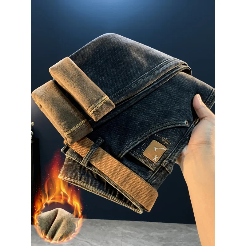 جينز رجالي شتوي مبطن بالصوف 2025 موضة جديدة عصرية قابلة للتمدد دافئة سميكة مستقيمة سليم صالح بناطيل ضيقة