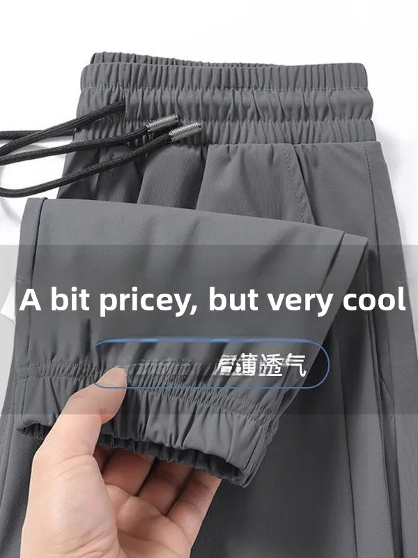 Męskie spodnie z jedwabiu lodowego na lato 2025, luźny krój, szybkoschnące, oddychające, młodzieżowe spodnie sportowe, długie spodnie.