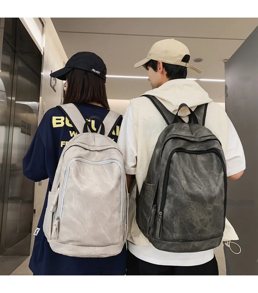 School bag men's PU soft leather large-capacity solid color backpack Harajufeng junior high school student travel backpack