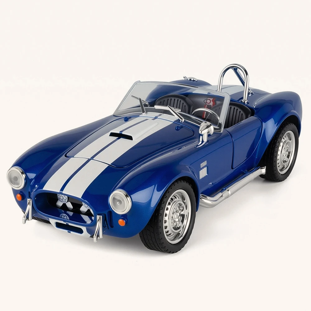 

Модель-копия Shelby Cobra Convertible Roadster 1965 года в масштабе 1:24 со звуковыми и световыми эффектами, функцией тяги, амортизацией и съемными колесами — подарок для мальчика