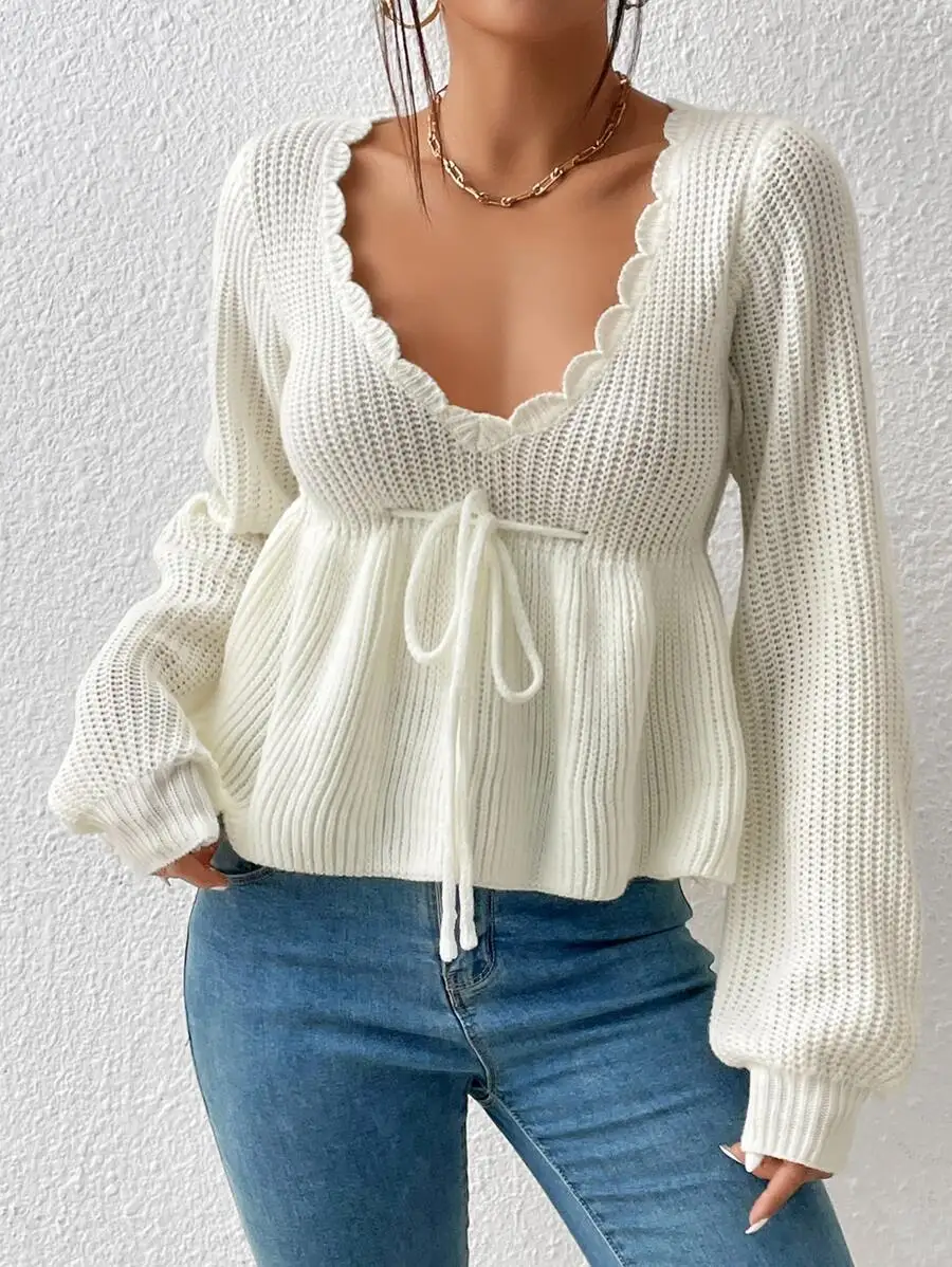

Cream Solid Deep V-Neck Ribbed Knit Sweater with Ruffled Trim and Drawstring Waist