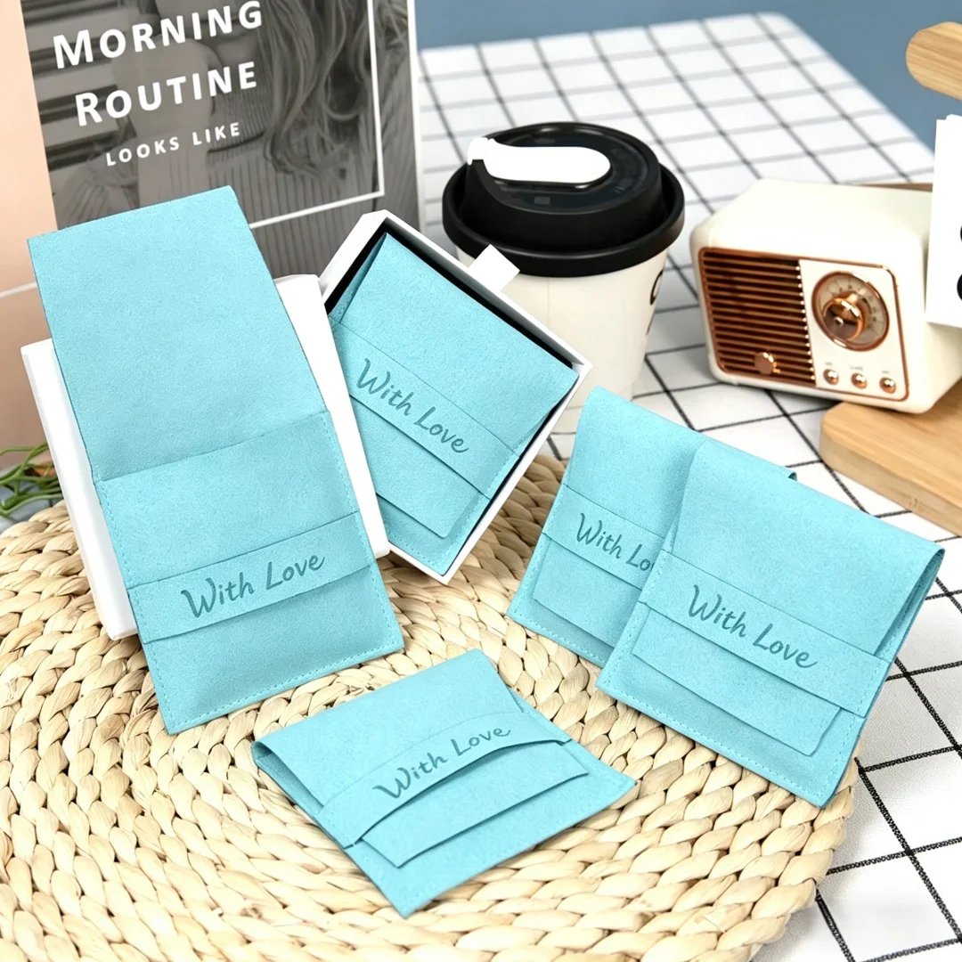 50pcs-blue-microfiber-jewelry-pouches-with-custom-logo-earring-necklace-bracelet-storage-suede-gift-bags-jewelry-packaging