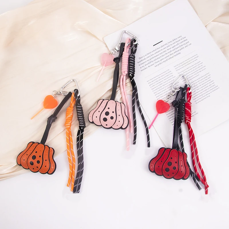 PU Leather Pumpkin Keychain with Woven Rope Lollipop Design Chic Bag Charm Car Hanging Accessory for All Saints Day Creativity