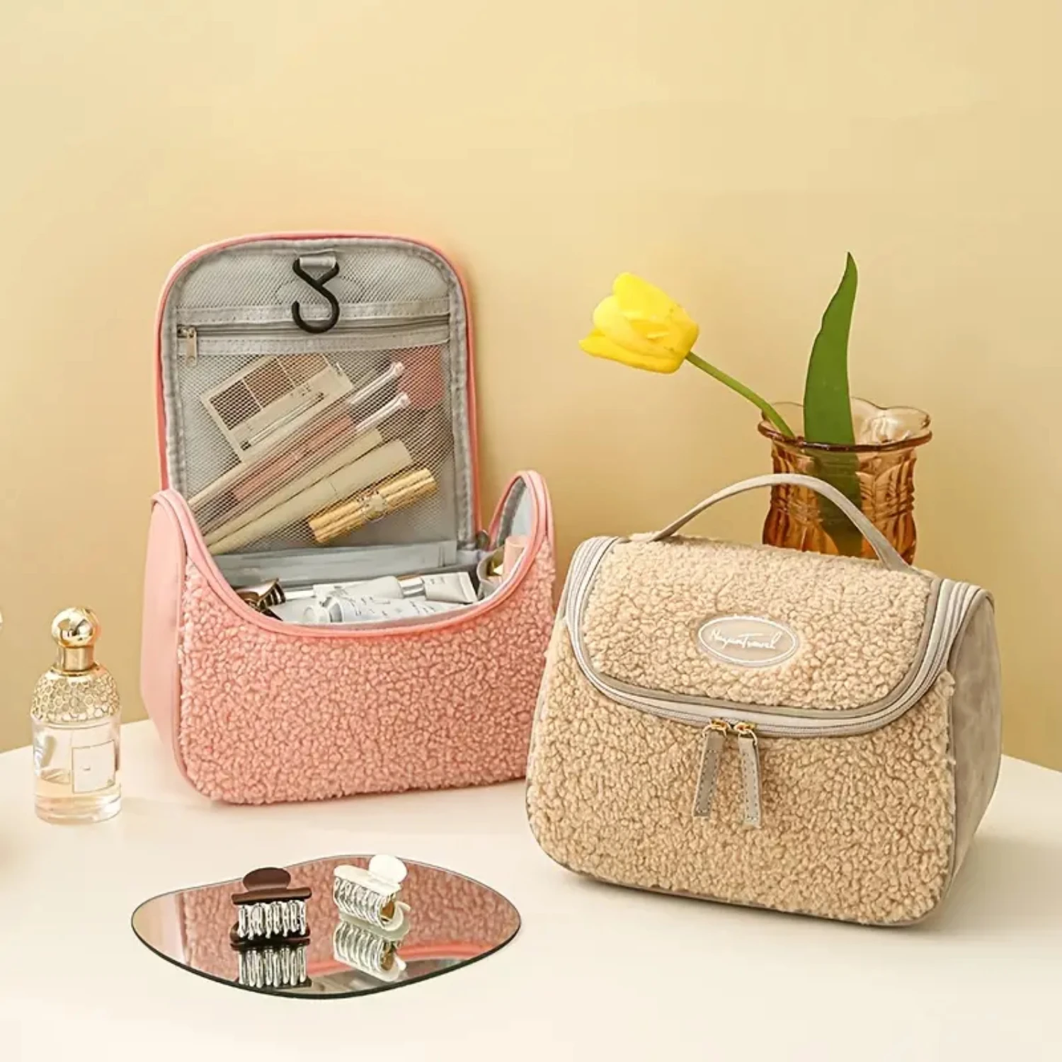 Travel in style with this spacious and plush Large Capacity Fuzzy Patch Detailed Cosmetic Bag. Perfect for all your toiletries a