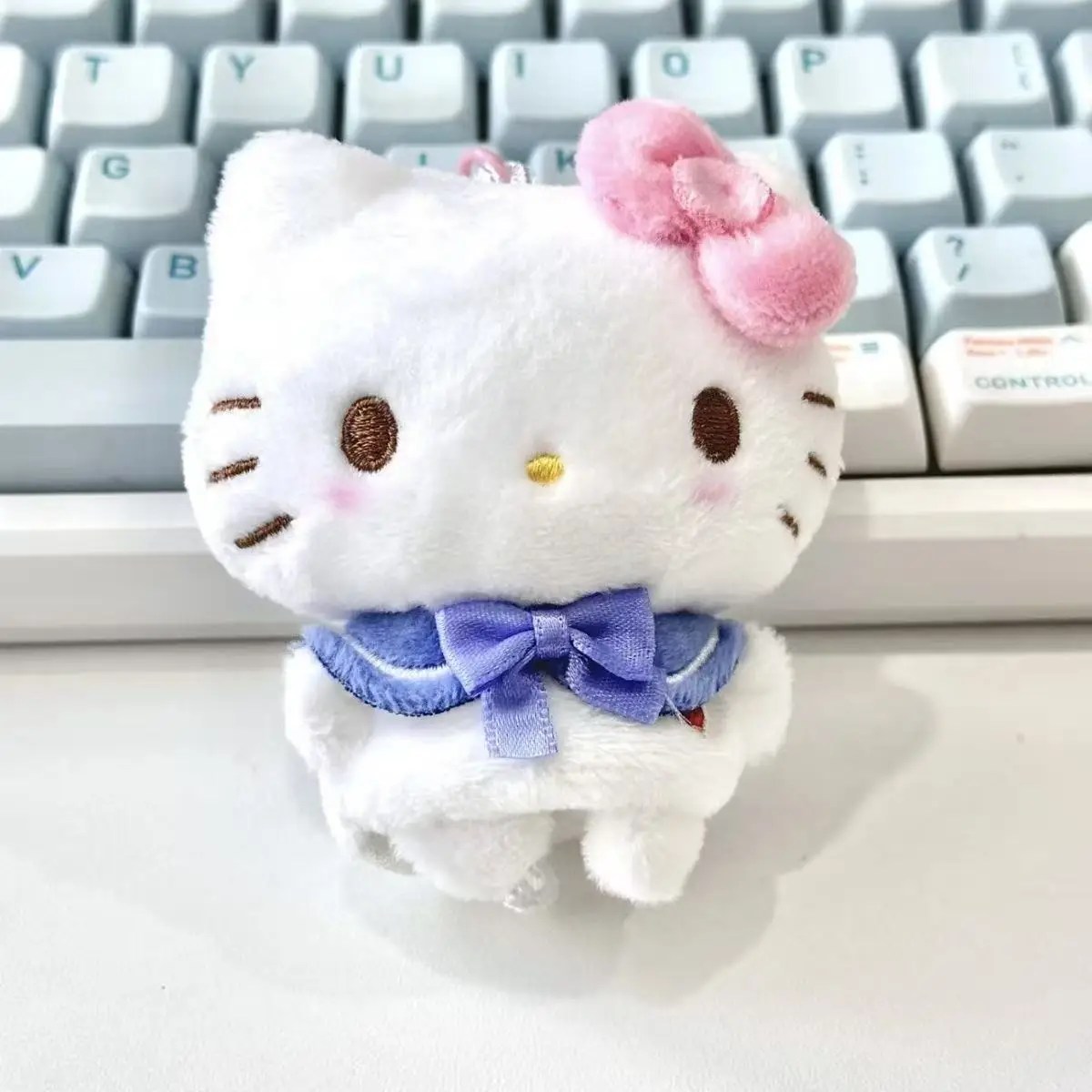 귀여운 산리오 헬로키티 봉제 인형 키체인 손가락 인형 파란 리본 장난감 봉제 동물 인형 키링 펜던트 장난감 소녀용