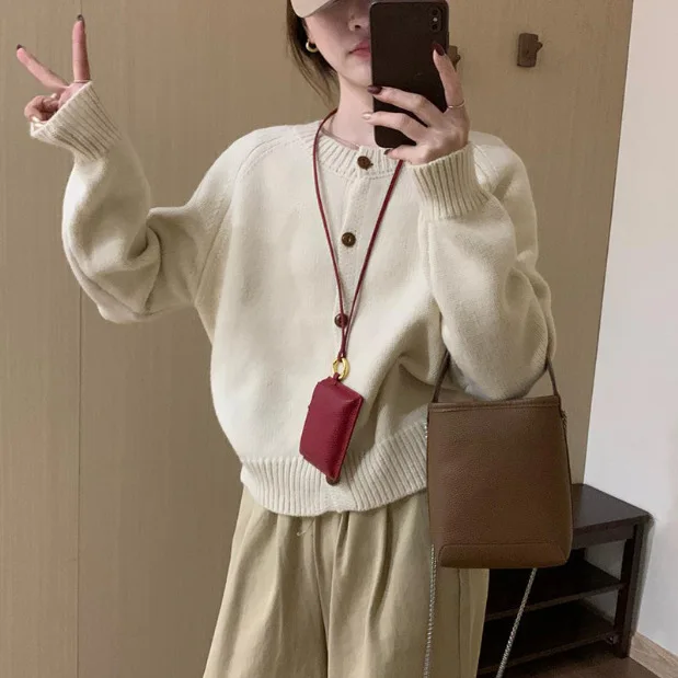 Design Sense: Solid Color, Simple Round Neck Knitted Cardigan for Women in Autumn and Winter, Lazy Style, Loose and Soft Texture 3