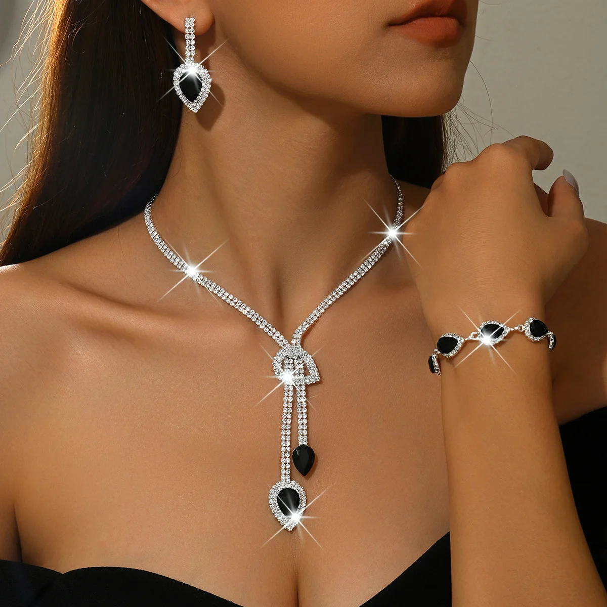 

Electroplated droplet tassel earrings, necklace and bracelet - fashionable and luxurious wedding jewelry set