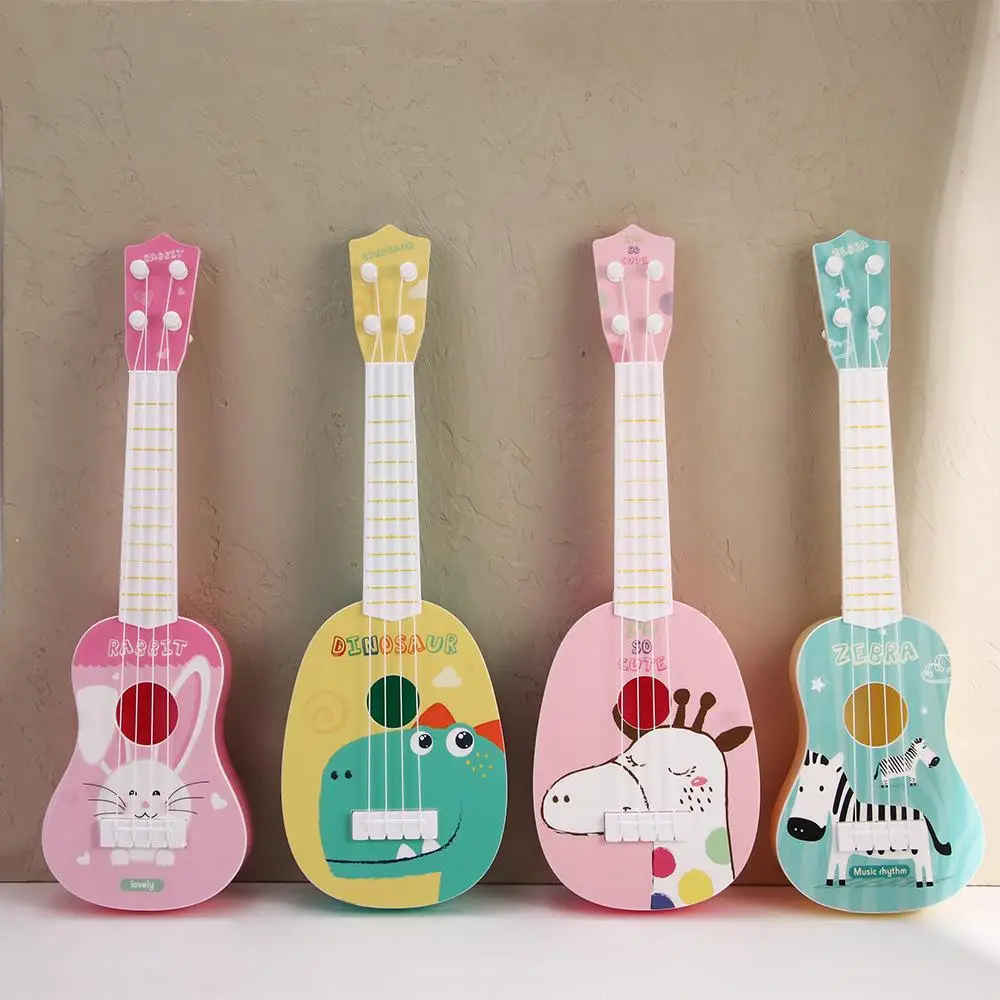 1PC การ์ตูนสัตว์รูปแบบ MINI Ukulele เครื่องดนตรี Montessori ของเล่นเด็กกีตาร์ของเล่นเครื่องดนตรีของเล่นเพื่อการศึกษา