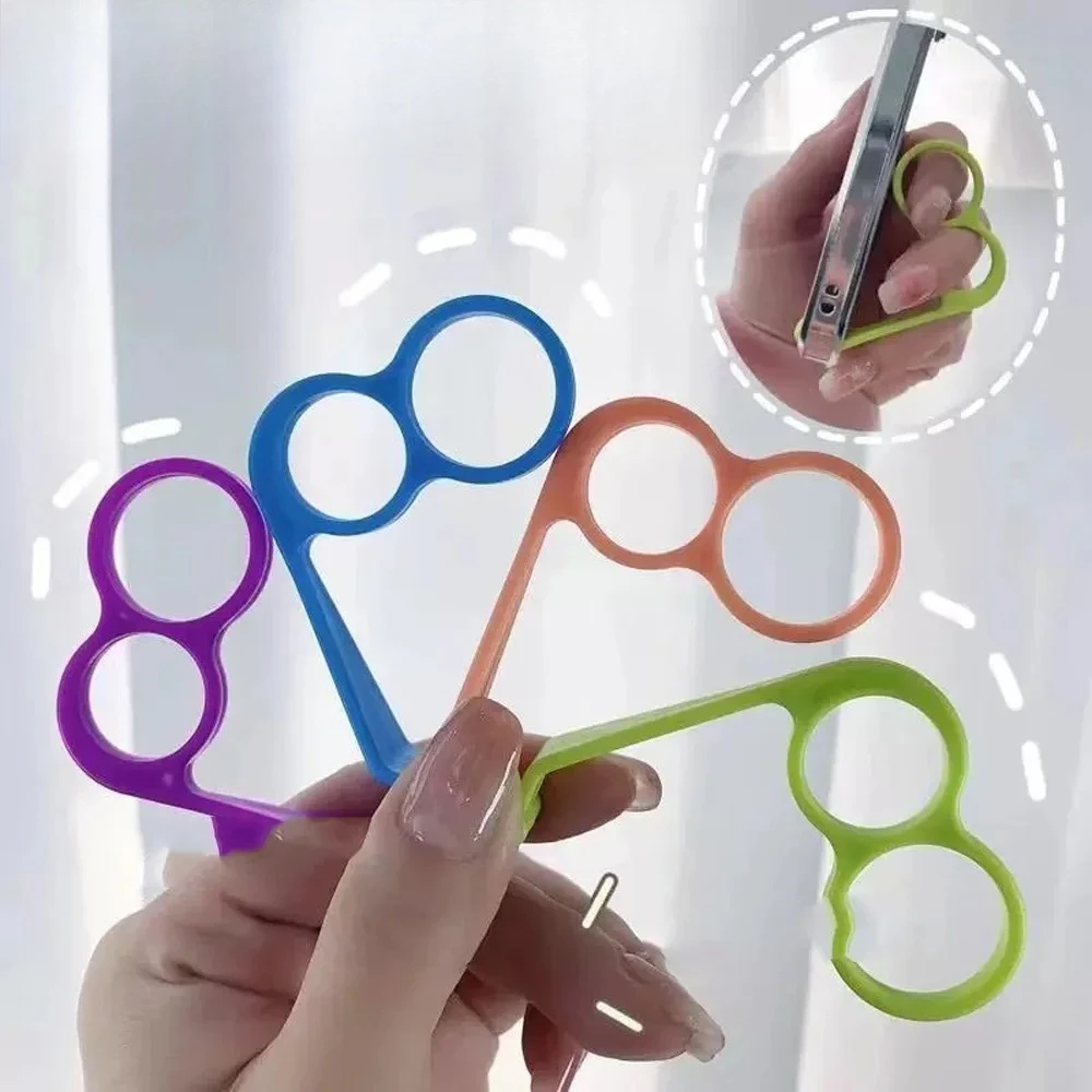 

Finger Phone Holder Plastic 2 Holes Little Finger and Ring Finger Grip Strap Holder for Hand Phone Stand Desktop Phone Stand