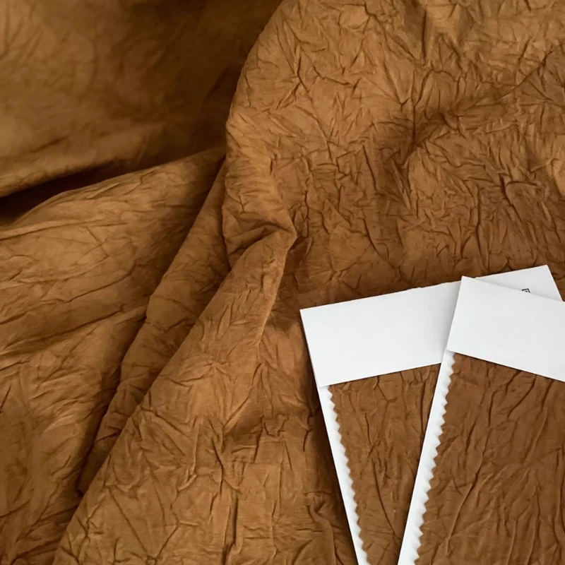 

Yellow Brown Wrinkled Irregular Texture Nylon Texture Designer Fabric for Runway Trench Coat Large Silhouette Clothing Fabric