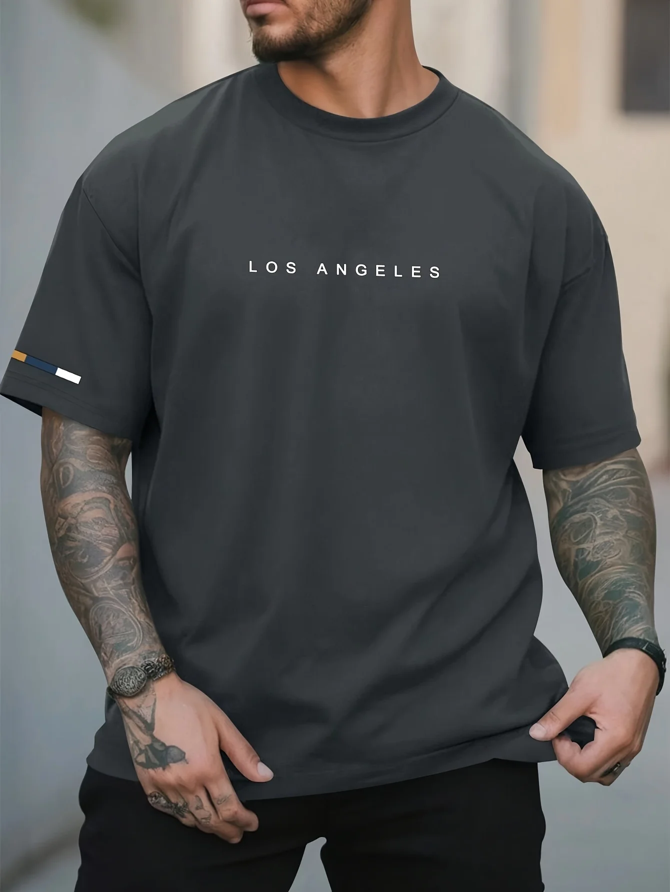 2025 لوس أنجلوس جرافيك طباعة الرجال العلامة التجارية الفاخرة القطن المعتاد قصيرة الأكمام الصيف للجنسين الرجال النساء بلوزة الشارع الشهير المحملة