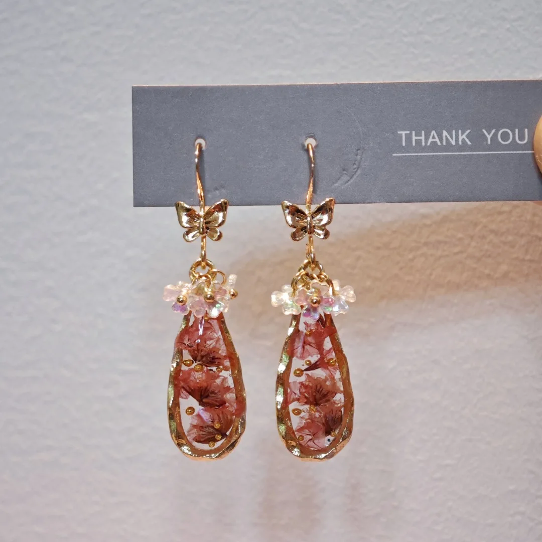 

3263 оптовая продажа, образец растений, сушеный цветок, смола, креативные серьги, подарок на Рождество, день рождения, динамические капли воды, товары для вечеринок