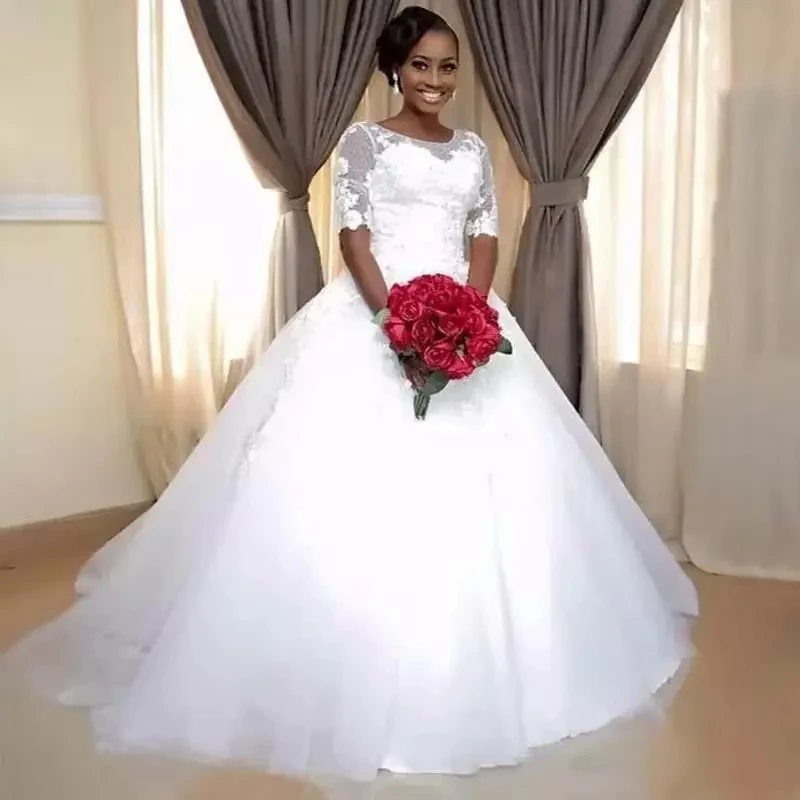 Personalizado africano uma linha vestidos de casamento ilusão jóia meia mangas rendas apliques trem varredura inchado formal vestidos de noiva