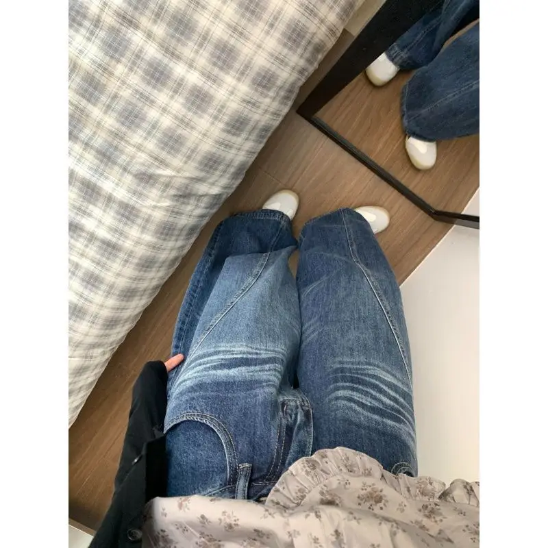 بنطال جينز أنيق على طراز الشارع الأمريكي بحاشية منحنية عتيقة للنساء بتصميم منفعل فضفاض مناسب للتخسيس وواسع الساق بطول الأرض من قماش الدنيم