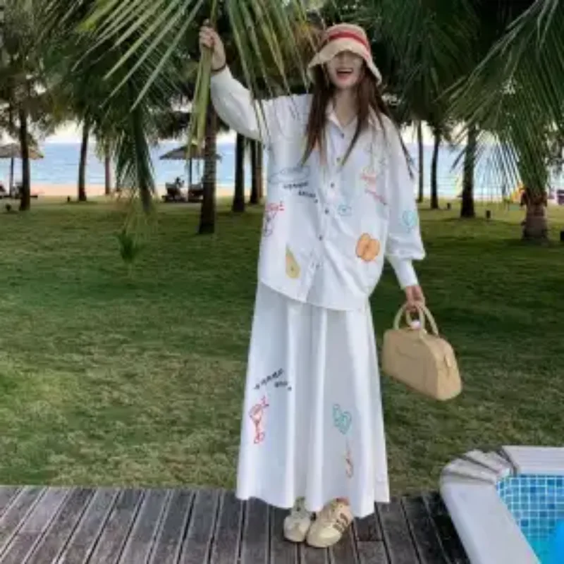 

Women's New Spliced POLO Collar Button Loose Commuting Embroidered Comfortable Long-sleeved Shirt