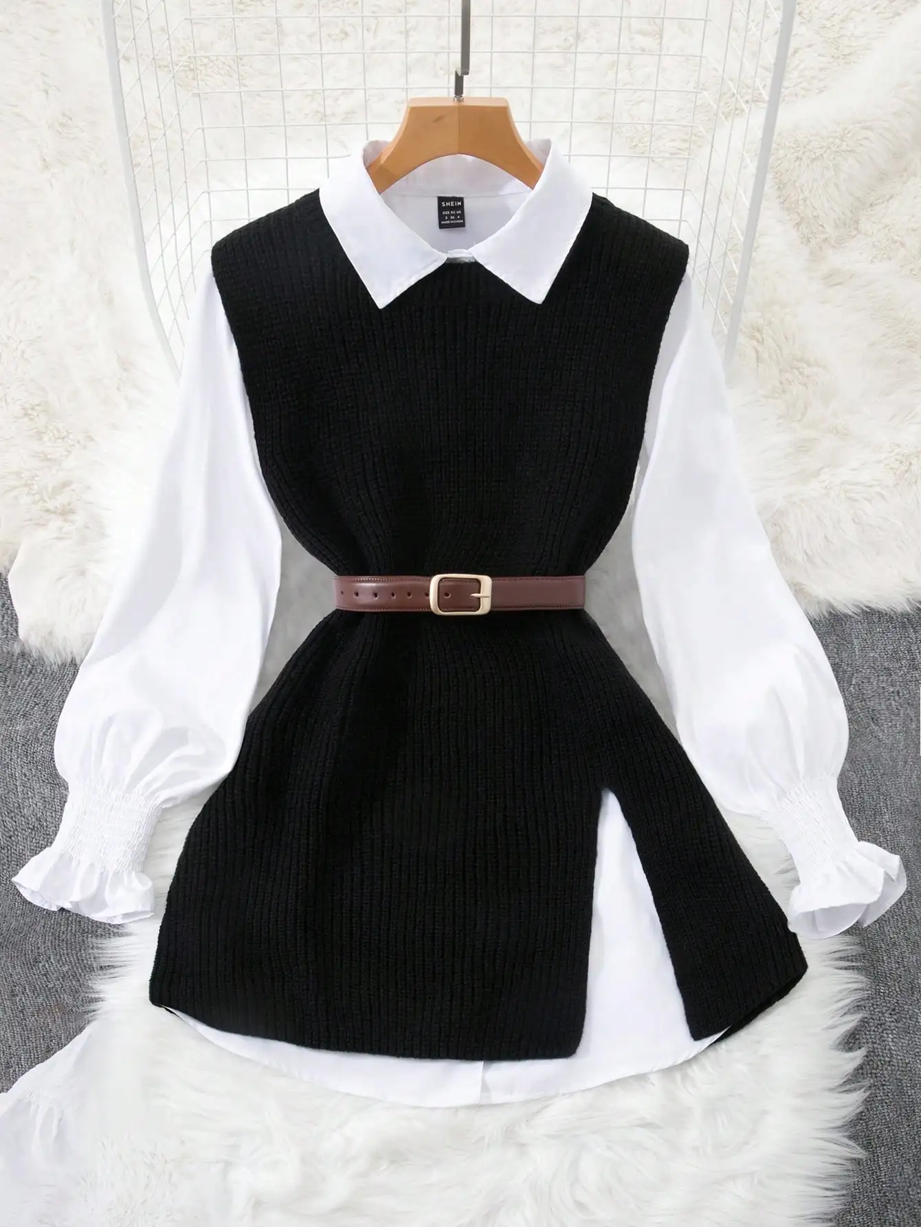

Women's Layered Outfit: White Lantern Sleeve Blouse with Black Knit Vest, Belted for Fall Winter