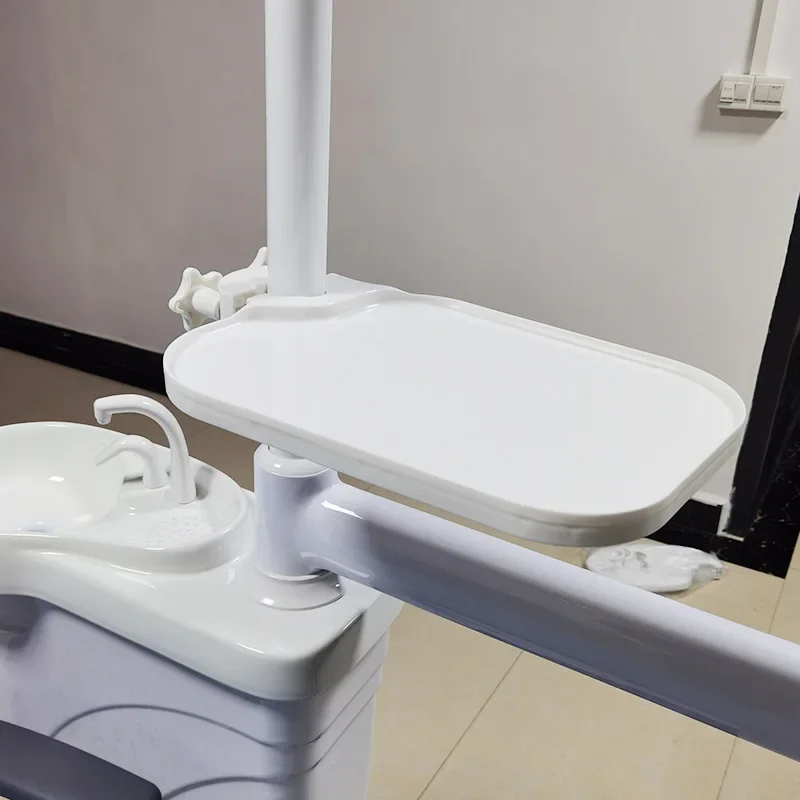 

Dental chair small tray oral instruments integrated machine attached table placing tray lamp post for dental cleaning