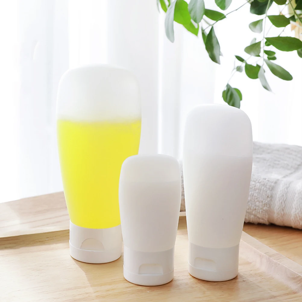 

4pcs Plastic Travel Makeup Bottles Flip Cap Empty Sub Bottles Dispensers Leakproof Refillable Lightweight Portable