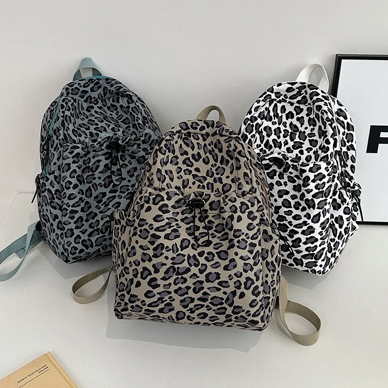 

Street Fashion Leopard Backpack Women Large Capacity Bag Harajuku Couples Versatile Travel Backpack Nylon Waterproof Backpack