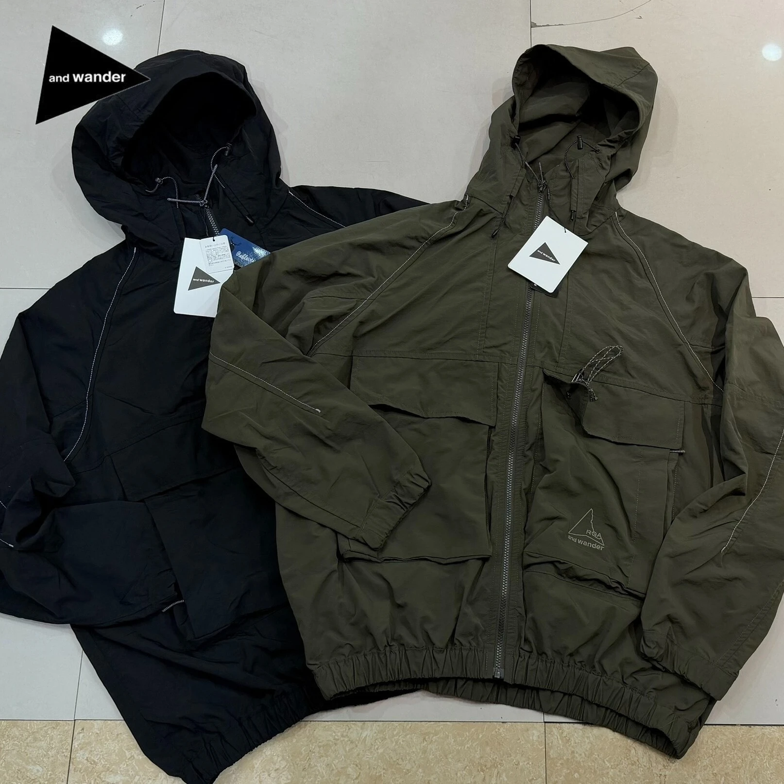 Lightweight Garment  Nylon Hooded Jacket Water Repellent Reflective Stitch Multi Pocket Outdoor Hiking Windbreaker for Men Women
