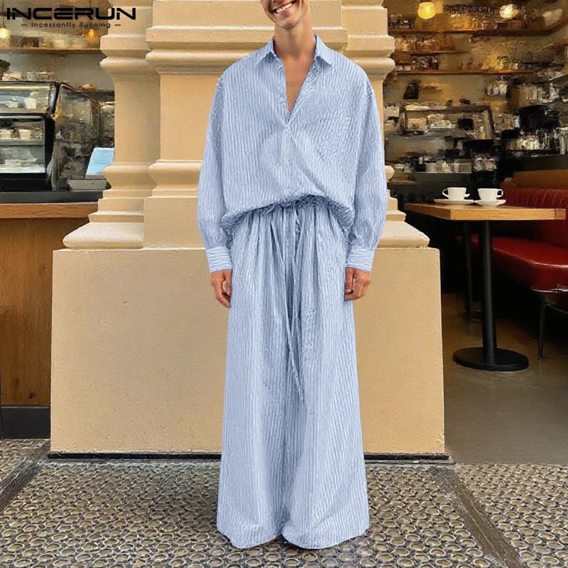 

INCERUN Мужские комплекты Полосатая свободная рубашка с длинными рукавами и широкие брюки Комплекты из двух предметов Уличная одежда Свободные повседневные мужские костюмы 2025 года