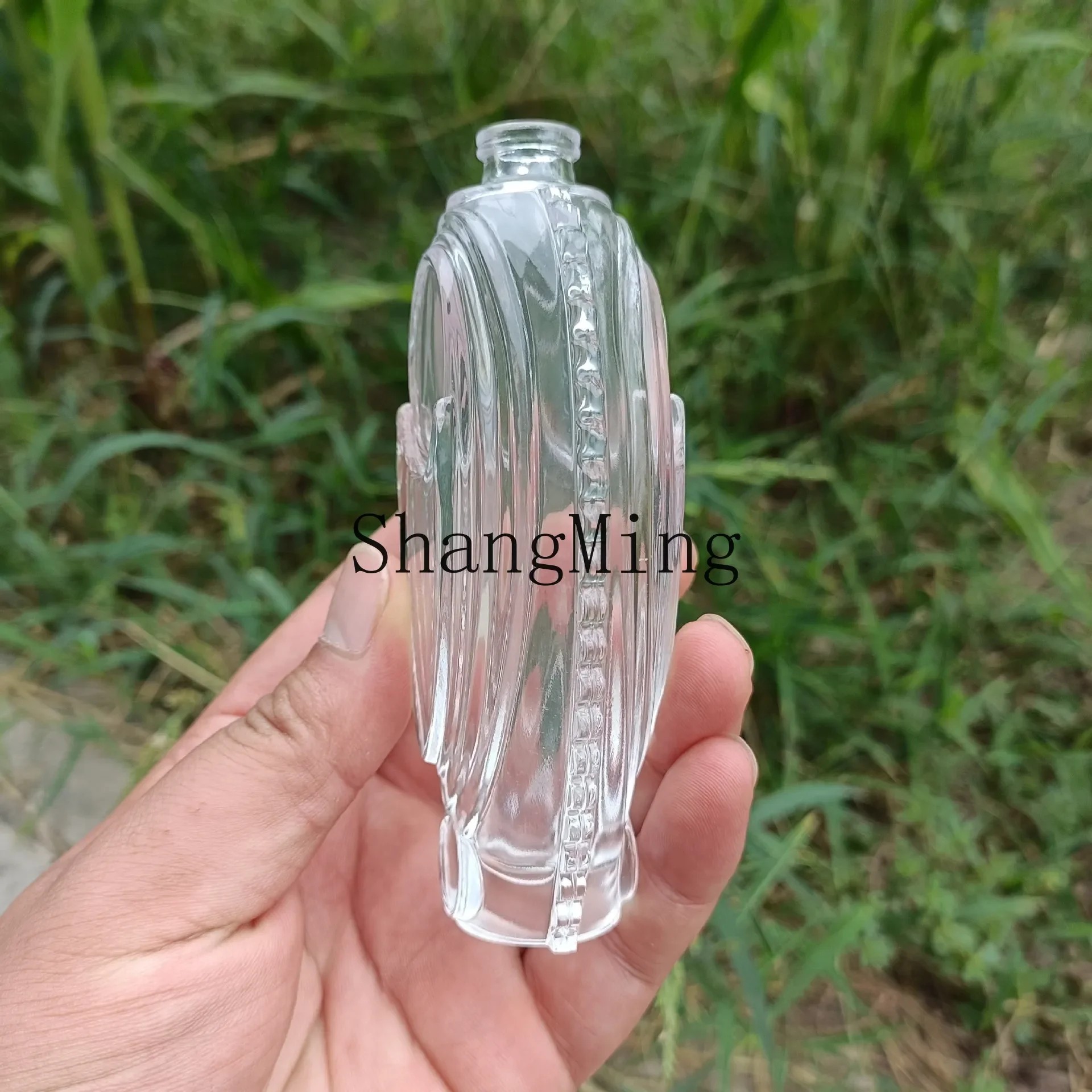

CL special-shaped perfume bottle, crystal white material glass, double play bead bayonet perfume bottle supplies