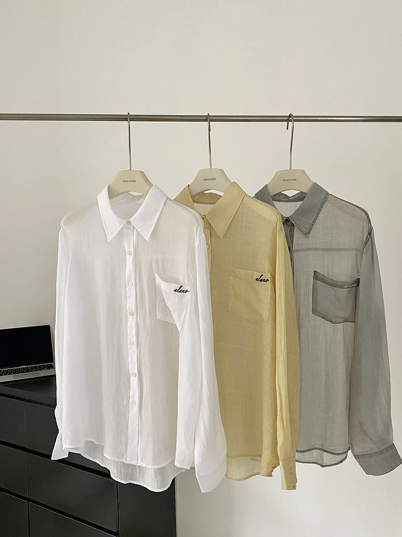 

Spring and summer women's casual solid color lapel long sleeved embroidered decoration loose shirt