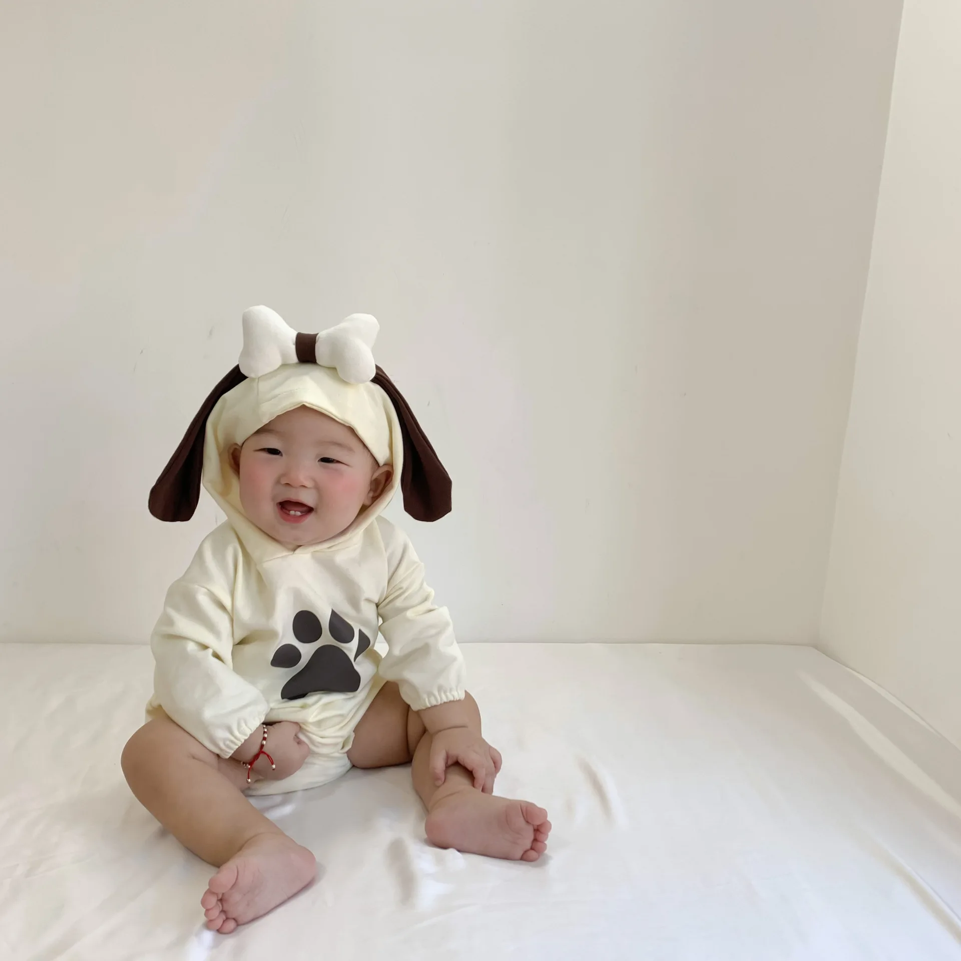 Ins Adorable chiot infantile à capuche barboteuse automne 2025 nouveau-né combinaison célébration Photo Shoot tenue bébé garçon fille vêtements