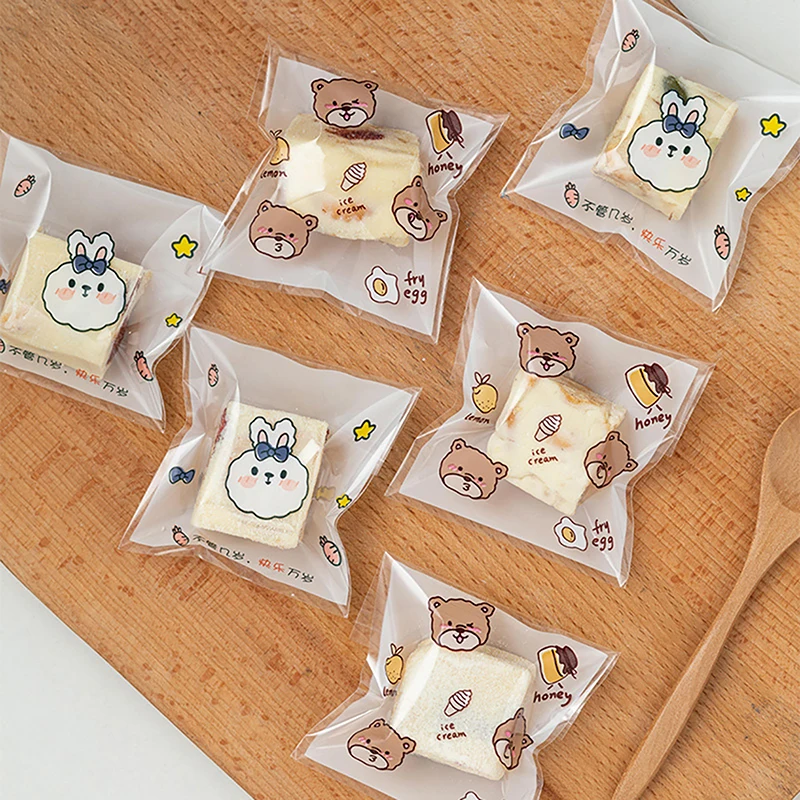 100Pcs Cartoon Cookie Packaging Bag Cookie Snowflake Crispy Packaging Self Sealing Bag Separate Transparent Cute Dessert Bags