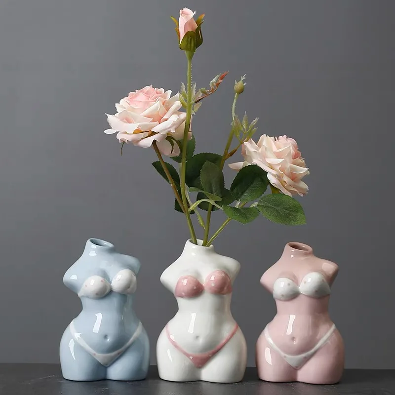 

Creative human body ceramic vase TV cabinet dining table flowers and small flower ware Rock mud rough pottery stone flower pot