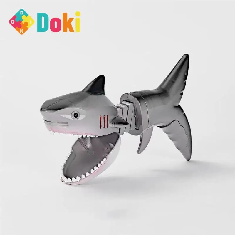 

Doki Toy Shark Dinosaur Tricky Spring Telescopic Hand Clip Creative Toy Launcher Decompression Children's Toy 2024 Dropshipping