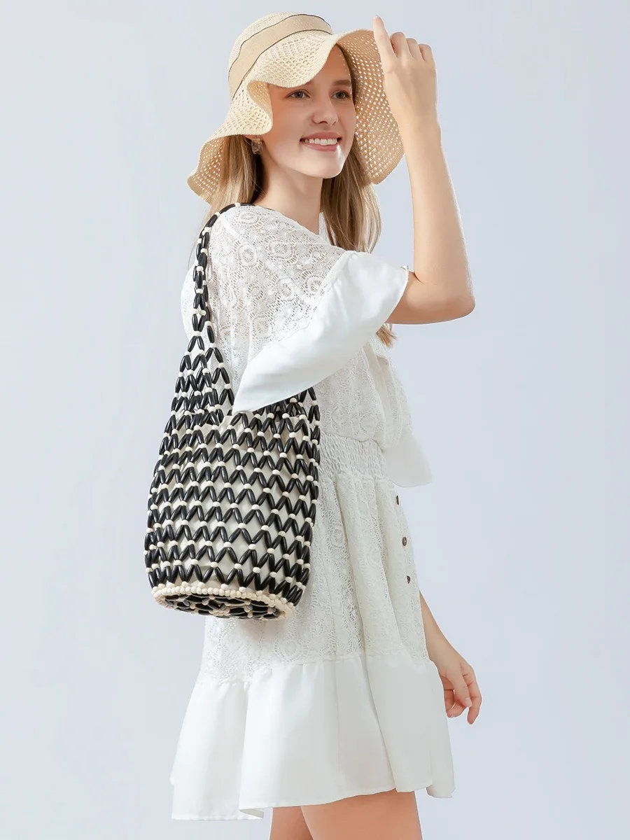 Hand-woven tote bag  design hollow wooden bead tote bucket net canvas travel shoulder bag seaside vacation hand-held bucket bag